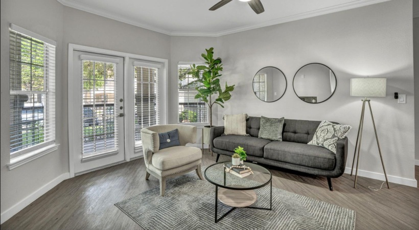 a living room with a couch and a table