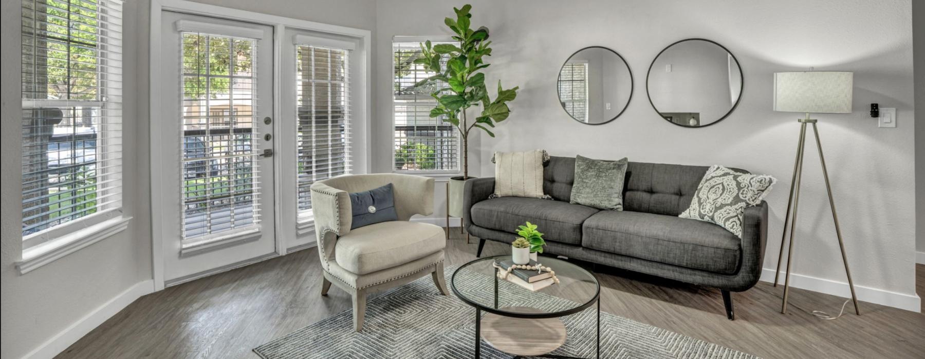a living room with a couch and a table